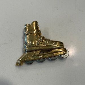 90’s Gold and silver tone Roller blade Brooch